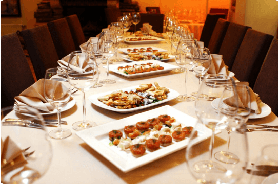 An image of a beautifully decorated table with chandeliers